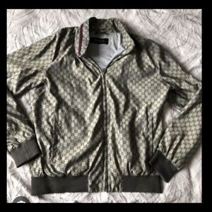 Gucci windbreaker jacket. Very nice material soft light weight.
